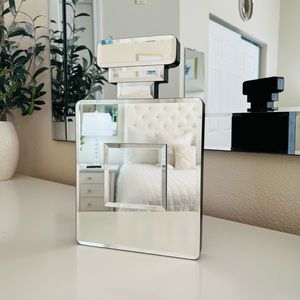 Chanel mirrored perfume bottle decor